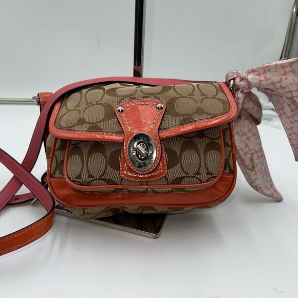 Coach Legacy Signature Canvas Crossbody Bag with a turn-lock closure. - Picture 1 of 11